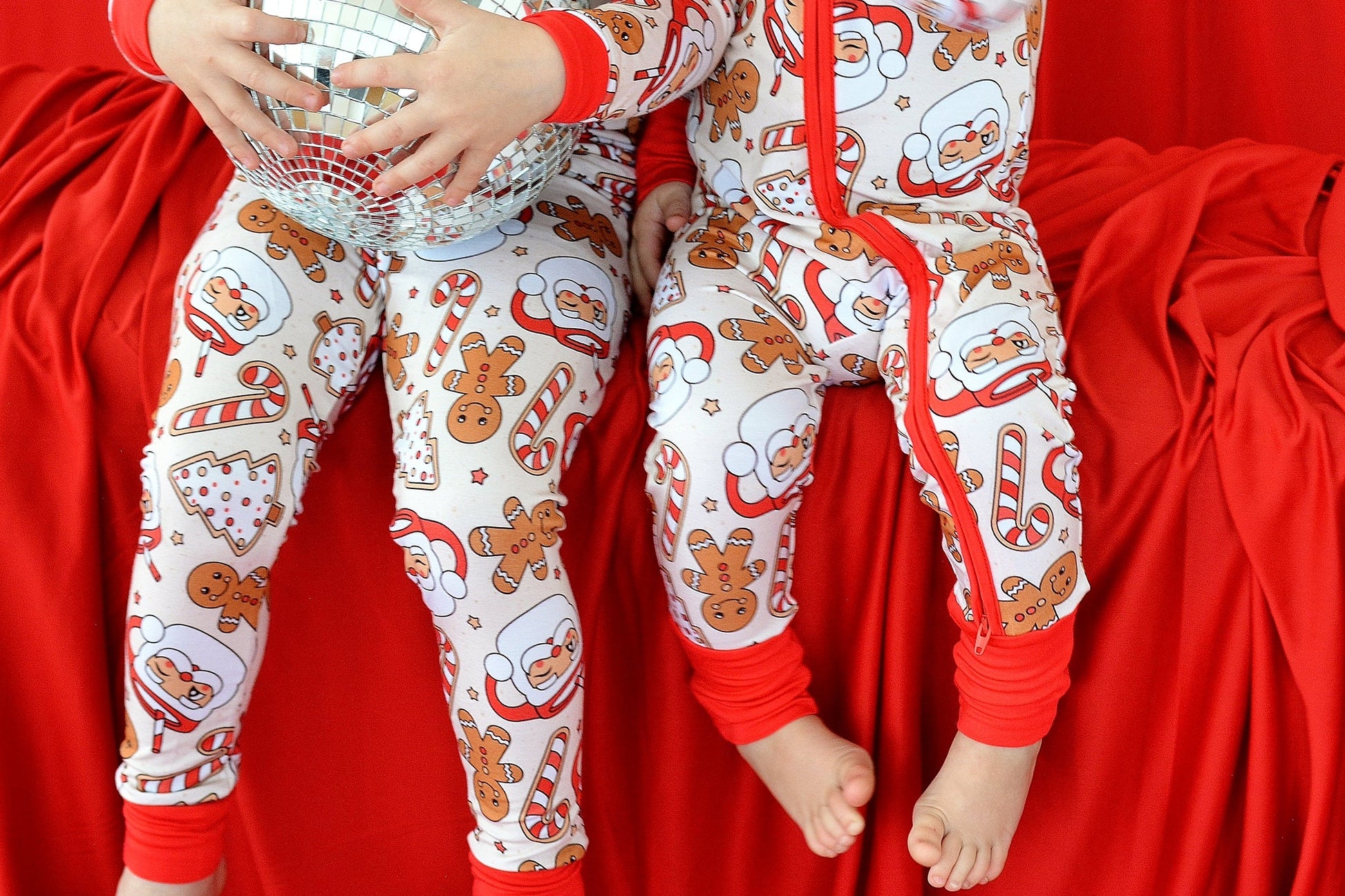 Toddler in Gingerbread Santa bamboo holiday pajamas — hypoallergenic gentle sleepwear perfect for Christmas gifting | AddieGrey & Co