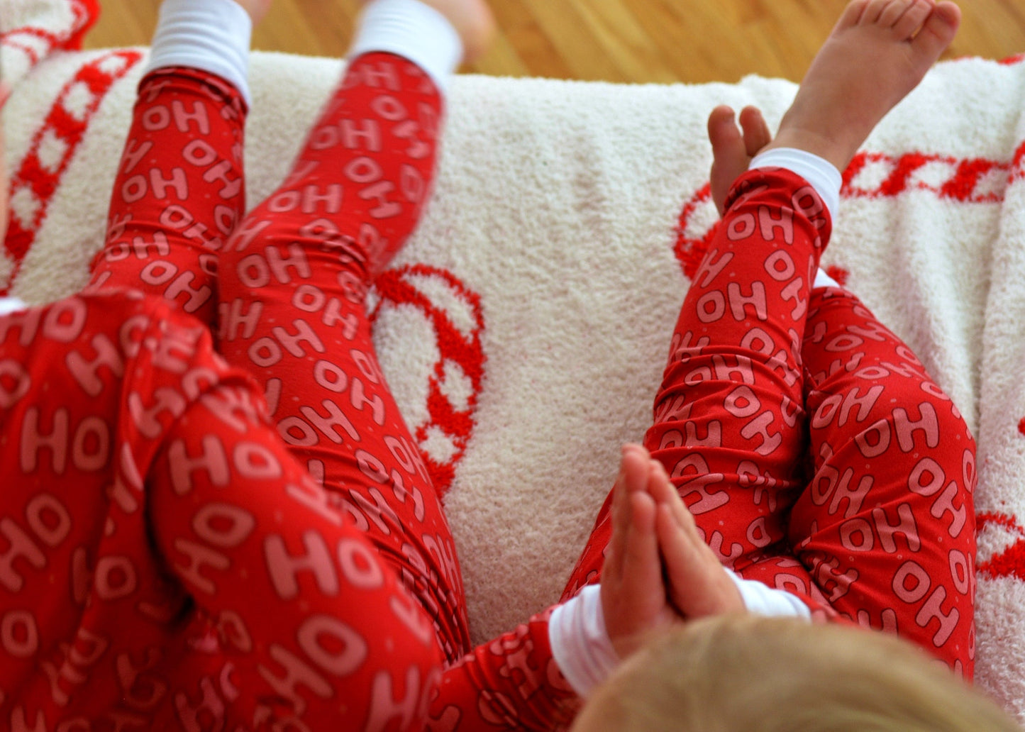 Kids in matching red Ho Ho Ho bamboo pajamas — Christmas holiday sleepwear perfect for family photos | AddieGrey & Co